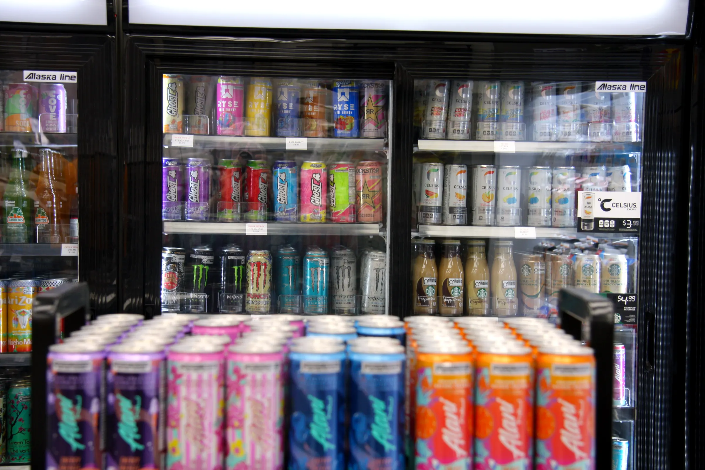 The energy display squared to the coolers, showing how deep the cold drink range runs behind it.
